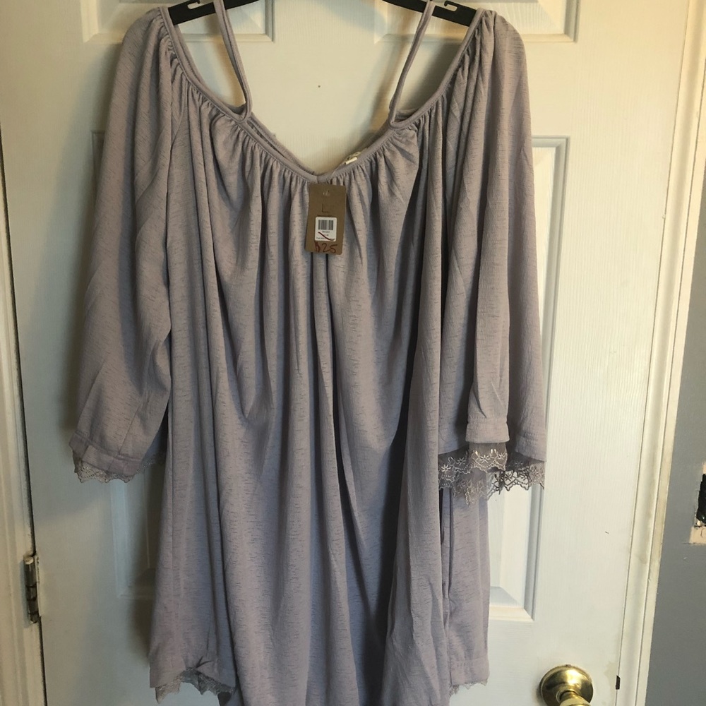 Brand new off shoulder tunic style top.